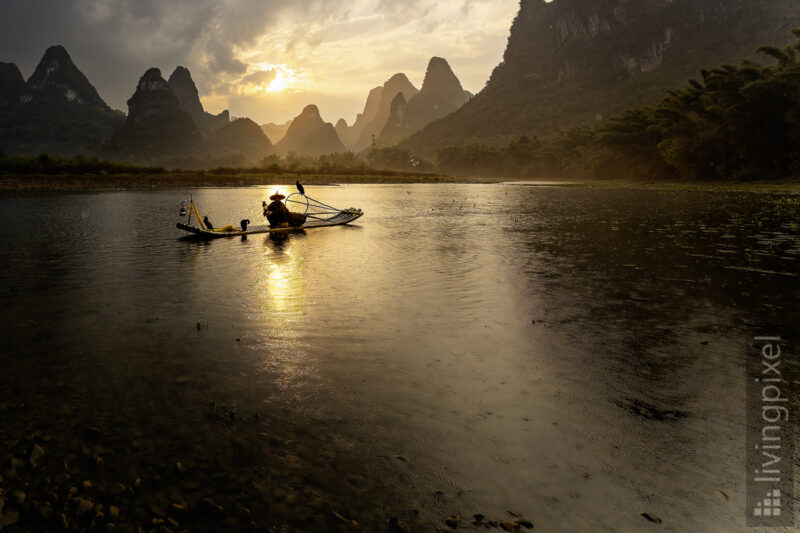 Kormoranfischer im Sonnenuntergang